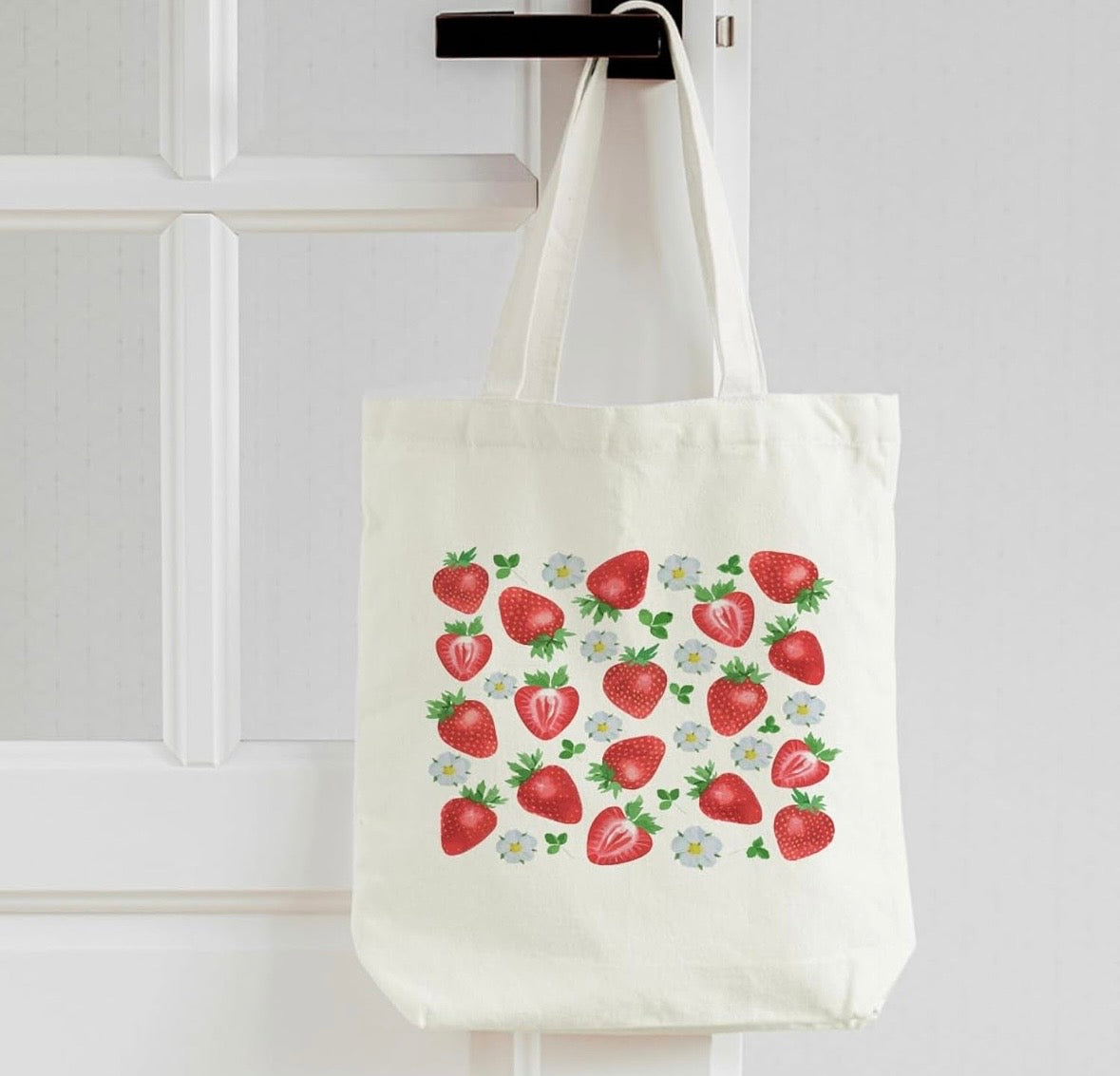 White tote bag with strawberry patterns gardener gift